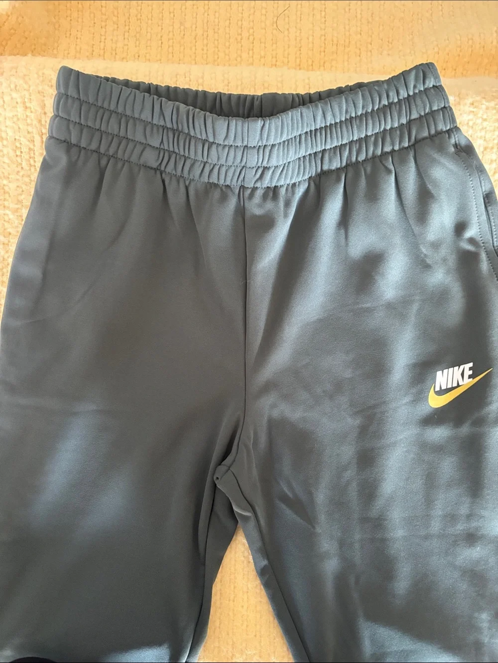 Nike Kids Dark Gray Joggers with Yellow Swoosh